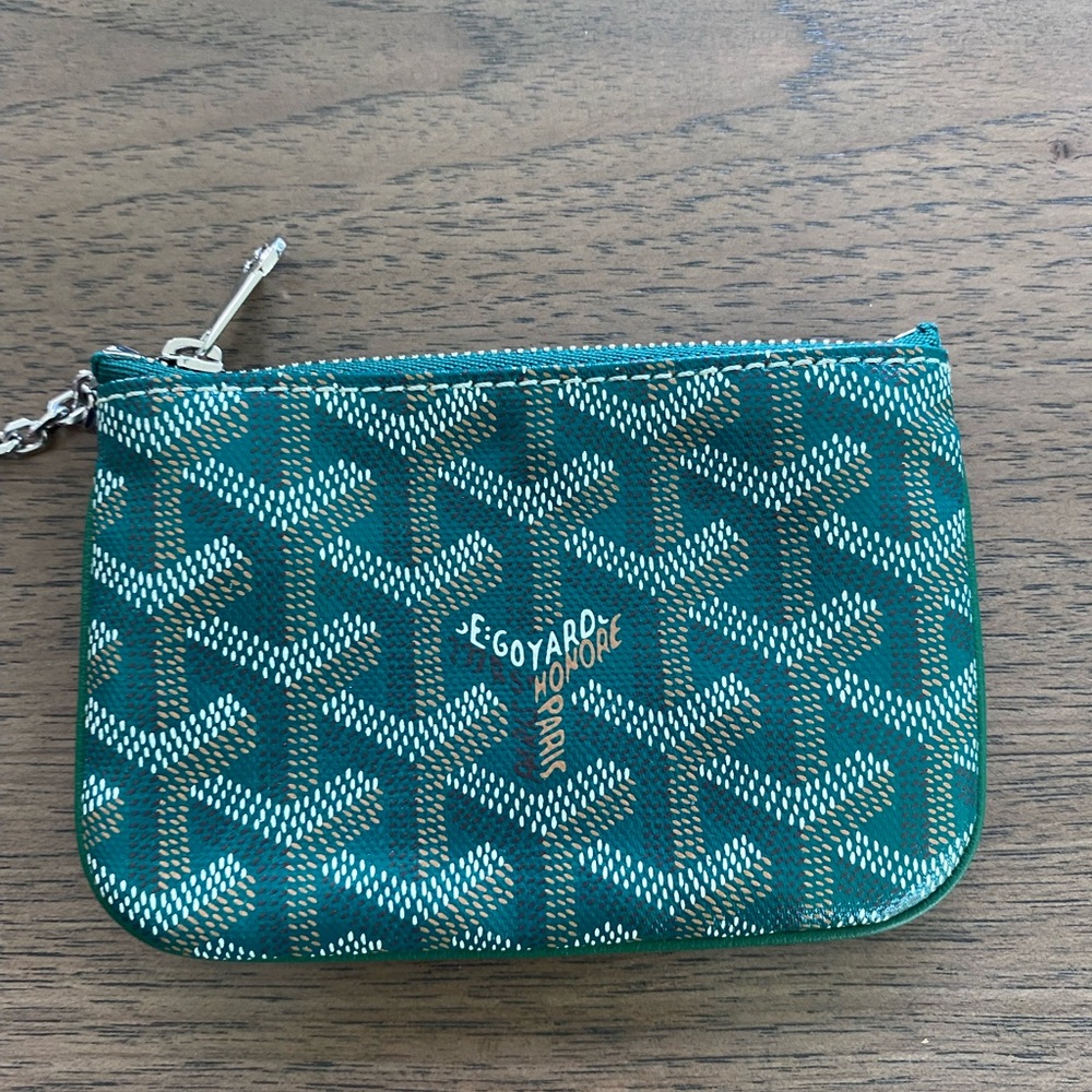 Goyard pouch.
